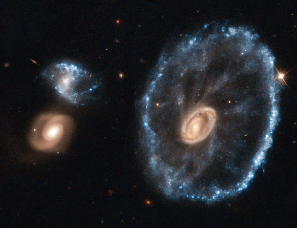 This image from the NASA/ESA Hubble Space Telescope shows the Cartwheel Galaxy. The image is based on earlier Hubble data of the Cartwheel that was reprocessed in 2010, bringing out more detail in the image than seen before. Image credit: NASA / ESA / Hubble.