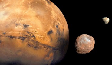 Mars is kept company by two cratered moons -- an inner moon named Phobos and an outer moon named Deimos. Image credit: NASA / JPL-Caltech / Malin Space Science Systems / Texas A&M University.