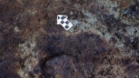 Photograph of a human footprint (center) at the Meay Channel I archaeology site on Calvert Island. Image credit: Duncan McLaren.