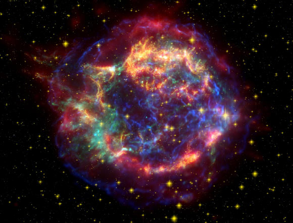 A false color image of Cassiopeia A using observations from NASA’s Spitzer Space Telescope and Chandra X-ray Observatory as well as the NASA/ESA Hubble Space Telescope. Image credit: NASA / JPL-Caltech.