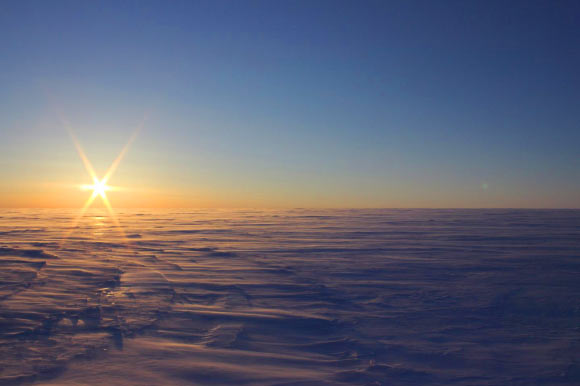 A cold and windy spring night on the vast landscape of the Devon Ice Cap where two subglacial lakes are lurking 1,805 to 2,460 feet (550-750 m) below the surface. Image credit: Anja Rutishauser.