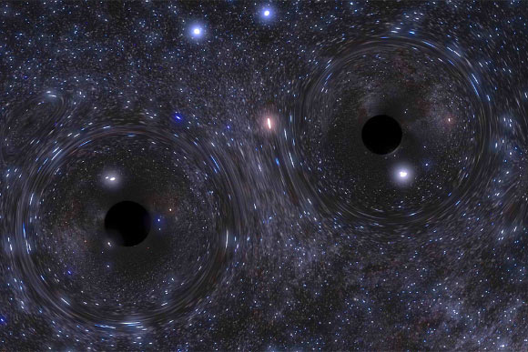 A snapshot of a simulation showing a binary black hole formed in the center of a globular cluster. Image credit: Northwestern Visualization / Carl Rodriguez.
