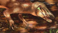 Tratayenia rosalesi crosses a stream in what is now Patagonia, Argentina roughly 85 million years ago. Image credit: Andrew McAfee, Carnegie Museum of Natural History.