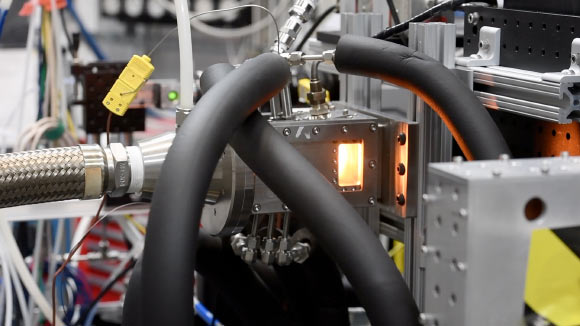 The researchers use powerful X-rays to see inside a gas turbine combustor during ignition. Image credit: David McNally.