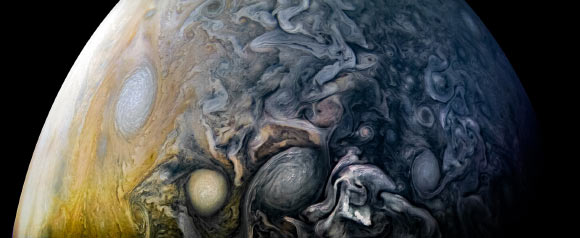 This Juno image hows intricate cloud patterns in the northern hemisphere of Jupiter. The color-enhanced image was taken on April 1 at 5:32 a.m. EST (2:32 a.m. PST), as Juno performed its twelfth close flyby of Jupiter. At the time the image was taken, the spacecraft was about 7,659 miles (12,326 km) from the tops of the clouds of the planet at a northern latitude of 50.2 degrees. Image credit: NASA / JPL-Caltech / SwRI / MSSS / Kevin M. Gill.