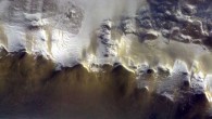 TGO’s CaSSIS camera captured this view of the rim of Korolev crater on April 15, 2018. The image is a composite of three images in different colors that were taken almost simultaneously. Image credit: ESA / Roscosmos / CaSSIS.