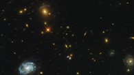 In the upper part of this Hubble image, the light from distant galaxies has been smeared and twisted into odd shapes, arcs, and streaks. This phenomenon indicates the presence of a massive galaxy cluster, SDSS J0150+2725, which is bending the light coming from the galaxies behind it with its monstrous gravitational influence. Image credit: NASA / ESA / Hubble / Judy Schmidt, www.geckzilla.com.
