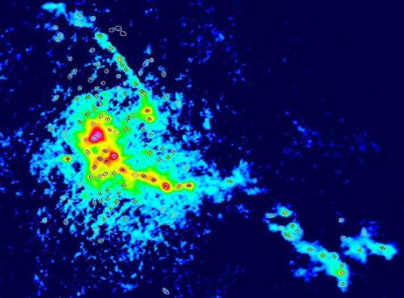 The active star-formation region W43-MM1, as observed using ALMA: 1.3 mm dust continuum emission is presumed to trace the column density of gas, revealing high-density filaments and embedded cores; ellipses outline core boundaries (at half-maximum); core masses span the range 1 to 100 solar masses and can therefore be expected to spawn stars with masses from 0.4 to over 40 solar masses; all cores are shown; hashed ellipses indicate the most robust identifications. Image credit: Motte et al.