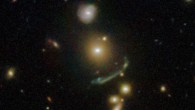In this Hubble image the light from a distant galaxy, nearly 9.5 billion light-years away, has been warped into a giant arc of light in the galaxy cluster SDSS J1156+1911. Image credit: NASA / ESA / Hubble / Judy Schmidt, www.geckzilla.com.