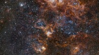 This image from the 256-megapixel OmegaCAM camera on ESO’s VLT Survey Telescope shows the Tarantula Nebula and its rich surroundings in great detail. It reveals a cosmic landscape of star clusters, glowing gas clouds and the scattered remains of supernova explosions. Image credit: ESO.