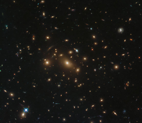 This Hubble image shows the giant galaxy cluster RXC J0949.8+1707. Image credit: NASA / ESA / Hubble / RELICS.
