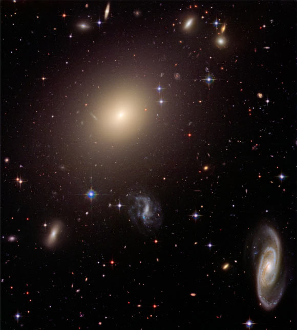 This Hubble image shows the diverse collection of galaxies in the galaxy cluster Abell S0740. The giant elliptical galaxy ESO 325-G004 looms large at the cluster’s center. Image credit: NASA / ESA / Hubble Heritage Team / STScI / AURA / J. Blakeslee, Washington State University.