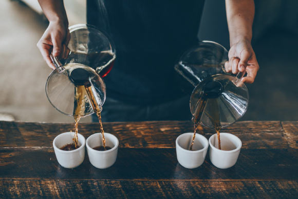 Physiological concentrations of caffeine equivalent to four cups of coffee have multiple protective effects. Image credit: Nathan Dumlao.