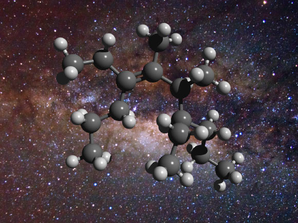 An illustration of the structure of a greasy carbon molecule, set against an image of the Milky Way’s center, where this material has been detected; carbon is represented as gray spheres and hydrogen as white spheres. Image credit: D. Young.