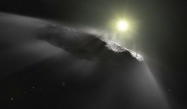 This artist’s impression shows ‘Oumuamua, the first interstellar object discovered in our Solar System. Recent observations show that the object is moving faster than predicted while leaving the Solar System. Astronomers assume that venting material from its surface due to solar heating is responsible for this behavior. This outgassing can be seen in this artist’s impression as a subtle cloud being ejected from the side of the object facing the Sun. Image credit: NASA / ESA / Hubble / ESO / M. Kornmesser.