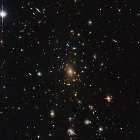 This Hubble image shows the giant galaxy cluster RXC J2211.7-0350. Image credit: NASA / ESA / Hubble / RELICS.