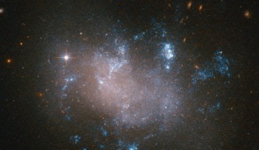 This Hubble image shows the irregular galaxy UGC 12682. Image credit: NASA / ESA / Hubble.