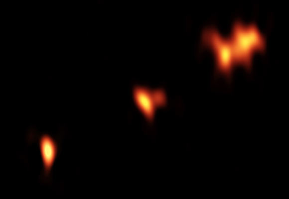 This VLBA image shows PSO J352.4034-15.3373; three main components of the object are seen, with two of them showing further substructure. Image credit: Momjian et al / B. Saxton / NRAO / AUI / NSF.