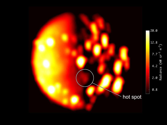 This image from NASA’s Juno spacecraft highlights the location of the new heat source close to the south pole of Io. The scale to the right of image depicts of the range of temperatures displayed in the infrared image. Higher recorded temperatures are characterized in brighter colors -- lower temperatures in darker colors. Image credit: NASA / JPL-Caltech / SwRI / ASI / INAF / JIRAM.