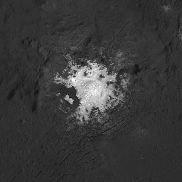 This mosaic of Cerealia Facula is based on images obtained by NASA’s Dawn spacecraft in its second extended mission, from an altitude as low as about 21 miles (34 km). The contrast in resolution obtained by the two phases is visible here, reflected by a few gaps in the high-resolution coverage. This image is superposed to a similar scene acquired in the low-altitude mapping orbit of the mission from an altitude of about 240 miles (385 km). The increased resolution afforded by the low altitude is revealing intimate details about the relationships between bright and dark materials across the facula, which will help resolve the mystery of its origin. Cerealia Facula is located at about 19.7 degrees north latitude and 239.6 degrees east longitude. Image credit: NASA / JPL-Caltech / UCLA / MPS / DLR / IDA / PSI.
