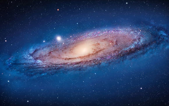 The Andromeda galaxy, also known as Messier 31 or M31, is located about 2.4 million light-years away from Earth in the constellation of Andromeda. It is the largest galaxy in the Local Group, which also contains our own Milky Way Galaxy and more than 50 other galaxies. Image credit: NASA.