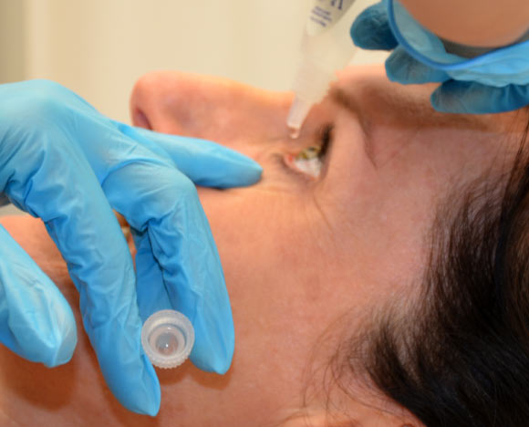 A medical professional applies eye drops to the eye. Image credit: British Columbia Institute of Technology / CC BY 4.0.