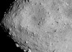 Hayabusa-2 image of the asteroid Ryugu as seen from a distance of 3.7 miles. A particularly large crater is visible near the center of the image. Image credit: JAXA / University of Tokyo / Kochi University / Rikkyo University / Nagoya University / Chiba Institute of Technology / Meiji University / University of Aizu / AIST.
