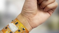 Wearable cytometry system on flexible PCB with integrated microfluidic polydimethylsiloxane chip, microcontroller, and BLE (Bluetooth Low Energy) readout to smartphone (not shown). Image credit: Furniturewalla et al, doi: 10.1038/s41378-018-0019-0.