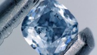 A blue, boron-bearing diamond with dark inclusions of a mineral called ferropericlase, which were examined as part of this study. This gem weighs 0.03 carats. Image credit: Evan Smith / Gemological Institute of America.