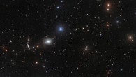This deep image of the area of sky around the elliptical galaxy NGC 5018 offers a spectacular view of its tenuous streams of stars and gas. These delicate features are hallmarks of galactic interactions, and provide vital clues to the structure and dynamics of early-type galaxies. Image credit: Spavone et al / ESO.