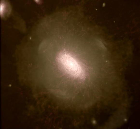 The distribution of satellite galaxies orbiting a computer-simulated galaxy, as predicted by the Lambda-cold-dark-matter cosmological model. Ultra-faint satellites are amongst the most ancient galaxies in the Universe; they began to form when the Universe was only about 100 million years old. Image credit: Institute for Computational Cosmology, Durham University / Heidelberg Institute for Theoretical Studies / Max Planck Institute for Astrophysics.