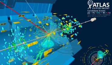 A candidate event display for the production of a Higgs boson decaying to two bottom quarks (blue cones), in association with a W boson decaying to a muon (red) and a neutrino. The neutrino leaves the detector unseen, and is reconstructed through the missing transverse energy (dashed line). Image credit: ATLAS Collaboration / CERN.
