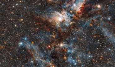 This image of the Carina Nebula reveals the dynamic cloud of interstellar matter and thinly spread gas and dust as never before; the massive stars in the interior of this cosmic bubble emit intense radiation that causes the surrounding gas to glow; by contrast, other regions of the nebula contain dark pillars of dust cloaking newborn stars. Image credit: ESO / J. Emerson / M. Irwin / J. Lewis.