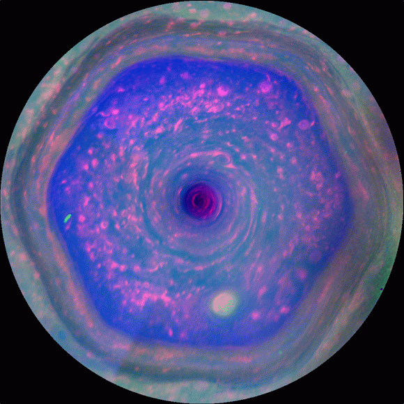This view shows the famous hexagon, located in the clouds surrounding Saturn’s northern pole. Comprising data gathered by NASA’s Cassini mission, this animated visual, published in 2012, offered the first ever color view of Saturn’s hexagon, and was the first animated view to cover such a large section of this part of the planet (from the north pole down to a latitude of roughly 70 degrees north). The hexagon itself is an intriguing, swirling system of air currents and turbulent weather. Unlike Earth’s hurricanes, the hexagon has endured for decades at least, and shows no signs of abating. Image credit: NASA / JPL-Caltech / SSI / Hampton University.