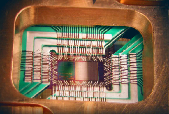 A chip designed to operate as a 128-qubit superconducting adiabatic quantum optimization processor. Image credit: D-Wave Systems, Inc.