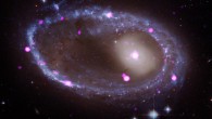 New data from NASA’s Chandra X-ray Observatory reveal the presence of very bright X-ray sources, most likely binary systems powered by either a stellar-mass black hole or neutron star, in the remarkable ring of the galaxy AM 0644-741. In this composite image, X-rays from Chandra (purple) have been combined with optical data from the NASA/ESA Hubble Space Telescope (red, green, and blue). Image credit: X-ray – NASA / CXC / INAF / A. Wolter et al; optical – NASA / STScI.