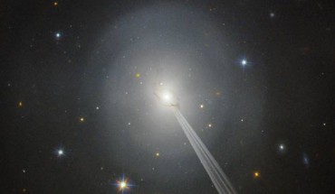 An artist’s impression of a jet emanating from NGC 4993. Image credit: J.A. Biretta et al / NASA / ESA / Hubble Heritage Team / STScI / AURA / Sci-News.com.
