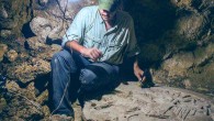 Archaeologist Dr. Marcello Canuto sits beside the ancient Maya altar he and his colleagues discovered in the jungles of northern Guatemala. Image credit: National Museum of Archaeology and Ethnology in Guatemala City / La Corona Regional Archaeological Project.