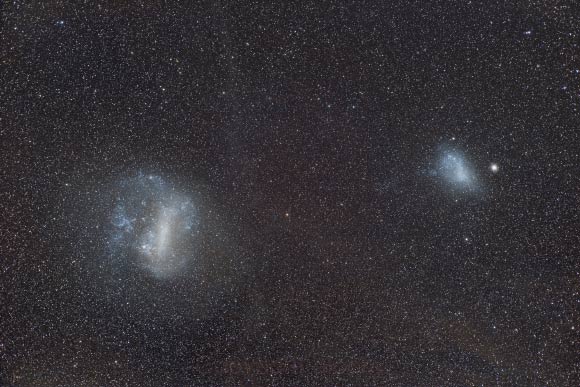 B. Armstrong & K. Bekki suggest that the Large (left) and Small Magellanic Clouds were originally a triplet system containing a companion dwarf galaxy. Image credit: Andrew Lockwood.