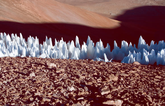 Terrestrial penitentes from the southern end of the Chajnantor plain, Chile, in 2005; the view is broadly northwards; blades can be seen perpendicular to the viewing direction. Image credit: ESO.