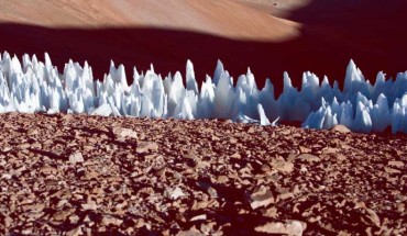 Terrestrial penitentes from the southern end of the Chajnantor plain, Chile, in 2005; the view is broadly northwards; blades can be seen perpendicular to the viewing direction. Image credit: ESO.