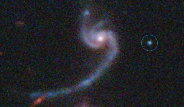 The faint supernova iPTF14gqr appeared in the outskirts of IV Zw 155, a spiral galaxy located 920 million light years away from us. Image credit: SDSS / Caltech / Keck.