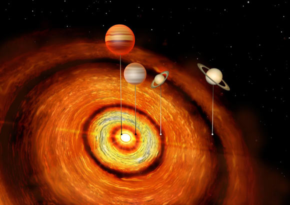 An artist’s impression of four gas giants in orbit around CI Tau. Image credit: University of Cambridge.