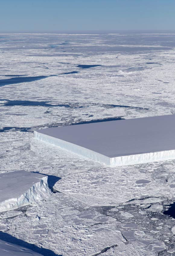 This image of the rectangular iceberg was taken during an Operation IceBridge flight over the northern Antarctic Peninsula on October 16, 2018. Image credit: Jeremy Harbeck, NASA.
