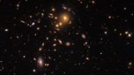 This Hubble image shows the strong-lensing galaxy cluster SDSS J0915+3826. Image credit: NASA / ESA / Hubble / Judy Schmidt, www.geckzilla.com.