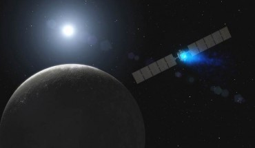 This artist’s concept shows NASA’s Dawn spacecraft arriving at Ceres. Image credit: NASA / JPL-Caltech.