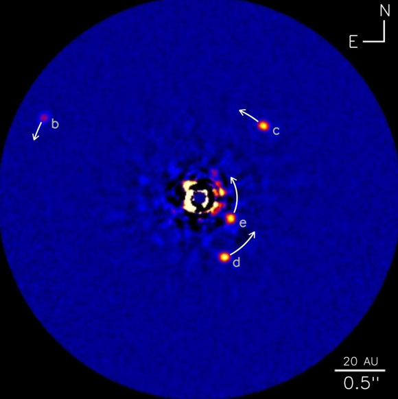 The HR 8799 planetary system is the first planetary system beyond our own that astronomers directly imaged. Captured in 2008 using Keck Observatory’s near-infrared adaptive optics, the picture revealed three planets orbiting a young star named HR 8799 (center). In 2010, astronomers announced they detected a fourth planet in the system -- HR 8799e. Image credit: NRC-HIA / C. Marois / W. M. Keck Observatory.