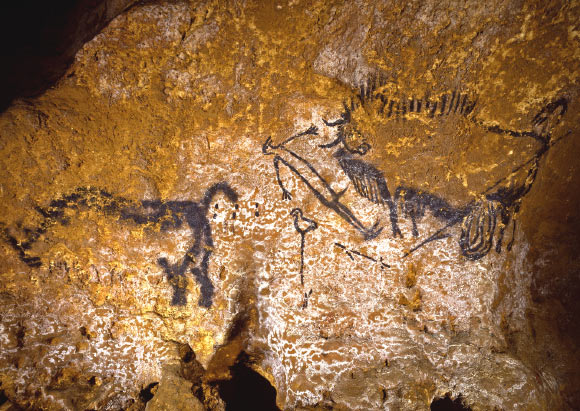 The Lascaux Shaft Scene: a panel with a rhino, a duck/goose and a disemboweled aurochs/bison with a dying man on the main wall. Image credit: © Ministère de la Culture / Centre National de la Préhistoire / Norbert Aujoulat.