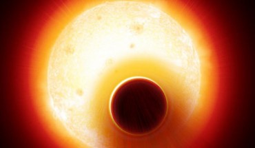 An artist’s impression of the exoplanet HAT-P-11b with its extended helium atmosphere blown away by the star, an orange dwarf star smaller, but more active, than the Sun. Image credit: Denis Bajram.