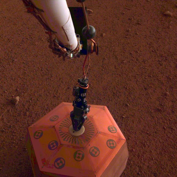 NASA’s InSight lander placed its seismometer on Mars on December 19, 2018. Image credit: NASA / JPL-Caltech.